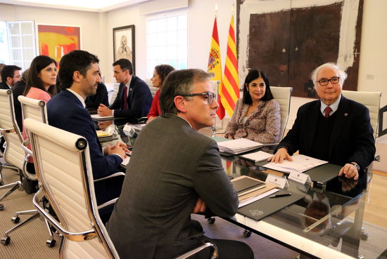 Image of both Catalan and Spanish delegations sitting at a table in Madrid on February 26, 2020 (by Gemma Tubert)